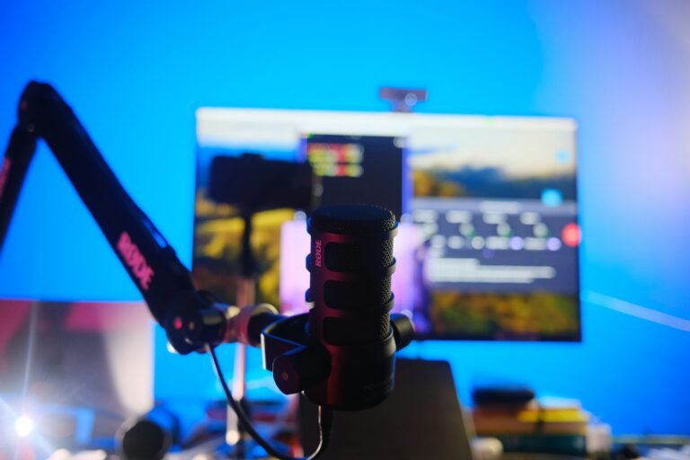 YouTuber at a desk with a microphone